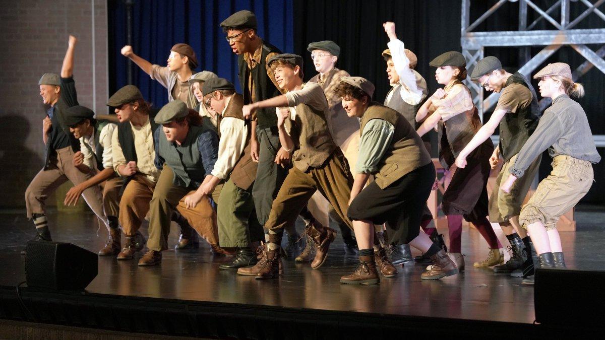 students performing in a musical